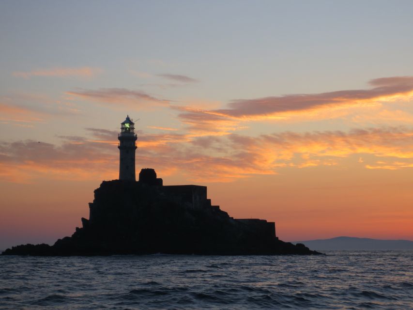 Baltimore Harbor: Sunset Cruise to Fastnet Rock Lighthouse - Leaving Baltimore Harbor with the white beacon in view