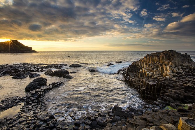 Dublin: Giant's Causeway, Dark Hedges, Dunluce and Belfast Titanic entrance fee - The bus ride, guide, and group size