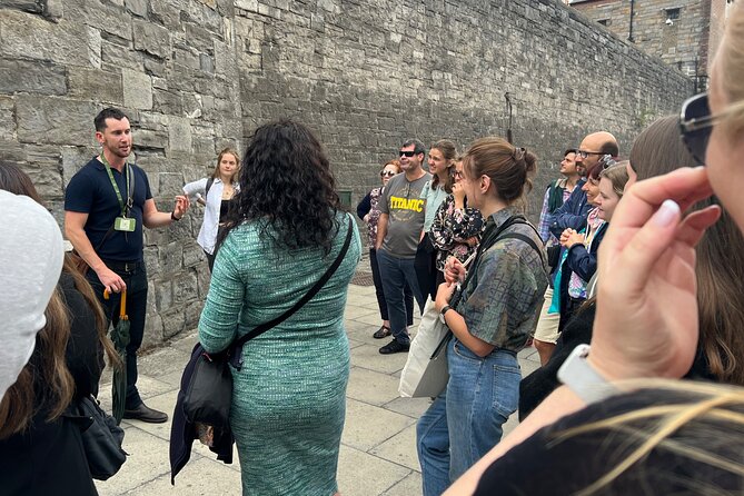 Dublin Highlights and Hidden Gems Guided Walking Tour - Crossing the Liffey on Ha’penny Bridge