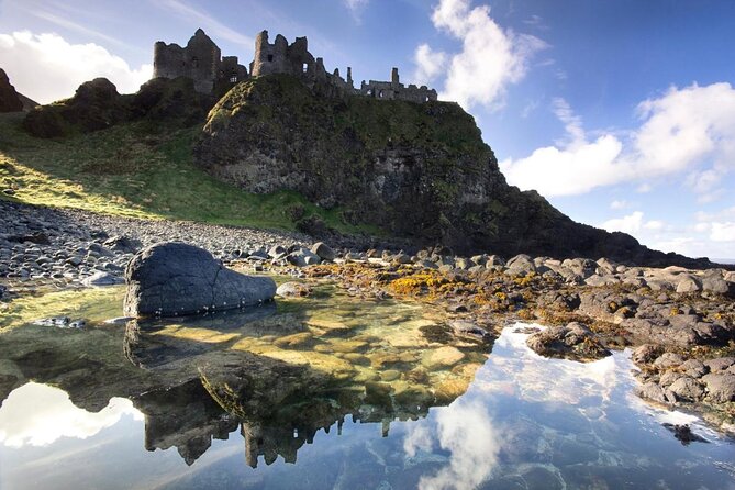 Dublin to Belfast Titanic, Dunluce Castle & Giant's Causeway Tour - Dunluce Castle on the Atlantic cliffs