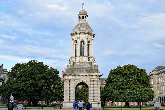 Dublin Walking Tour: Explore Top Sights & Hidden Gems - Crossing the Hapenny Bridge over the Liffey