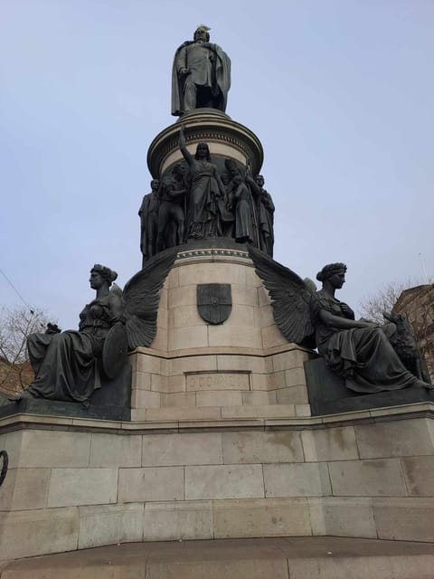 Dublin Walking Tour: Top 10 highlights - Crossing the Liffey by Ha’penny Bridge