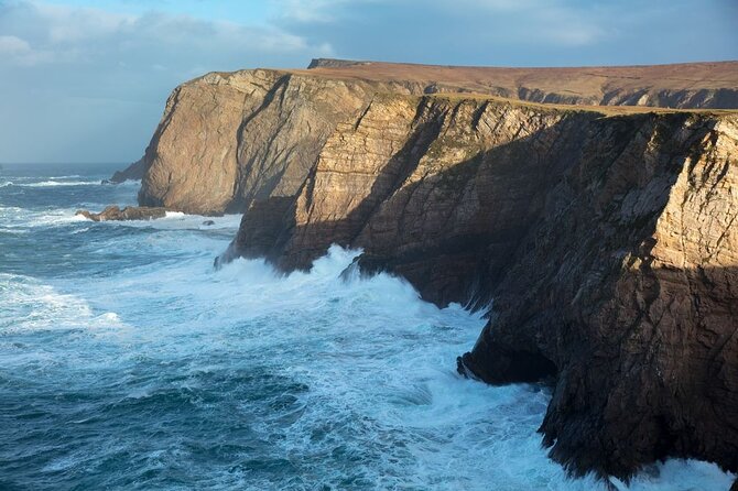Erris Head Guided Walking Tour (AlchemyTours.ie) - The Eire 69 sign, blowhole, and trig pillar