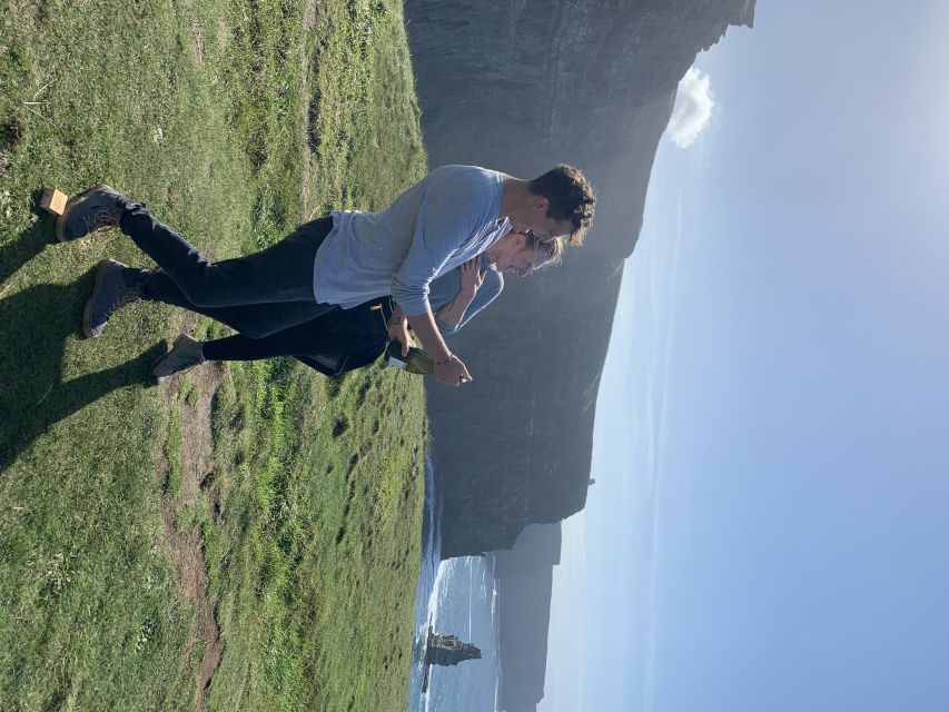 From Doolin: Cliffs of Moher Guided Coastal Walk - Aran Islands, Galway Bay, and the cliffs from changing angles