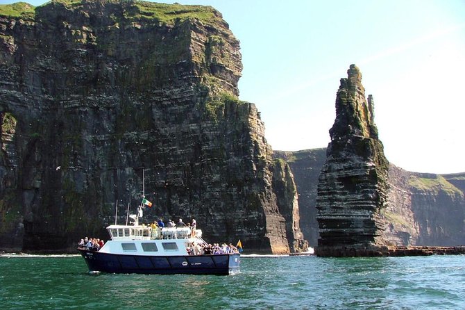 From Dublin: Cliffs of Moher, Bird of Prey & Aillwee Cave - Seeing the Cliffs of Moher from the Atlantic