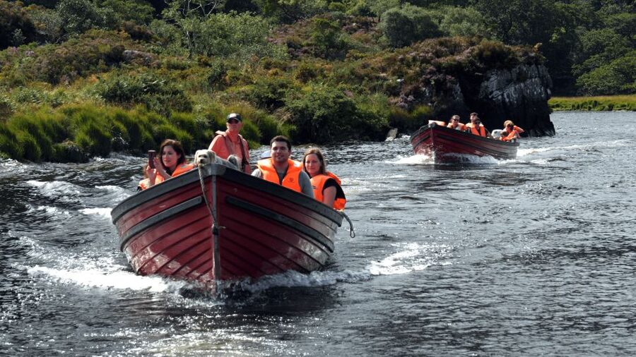 Killarney: Lakes of Killarney Boat Tour with Transfer - A traditional boat across the Lakes of Killarney