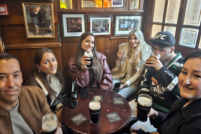 Pub Crawl Walking Tour Through the Heart of Irelands Capital - Walking toward Ha’penny Bridge